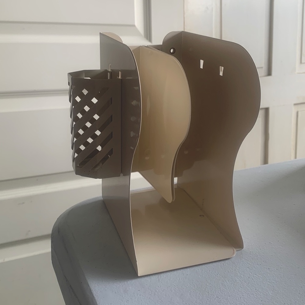 Book holder with spot for pencils
